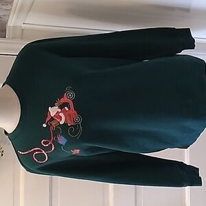 Holiday Editions medium Santa on a scooter sweatshirt Christmas